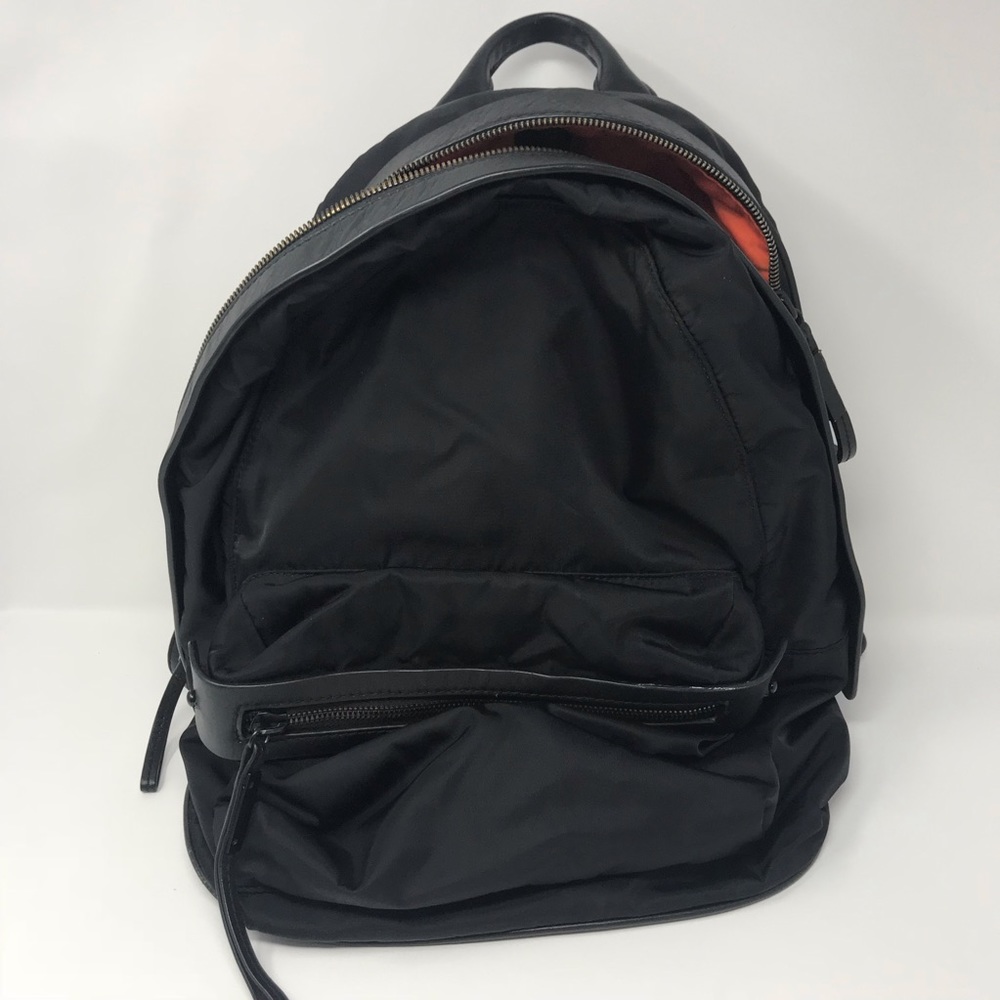 Black and orange backpack！